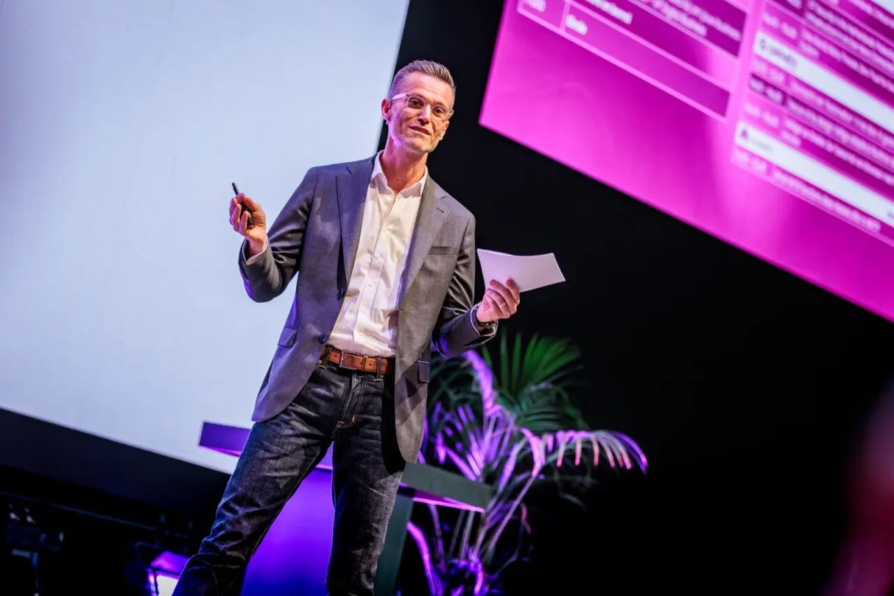 Olivier delivering a keynote on stage